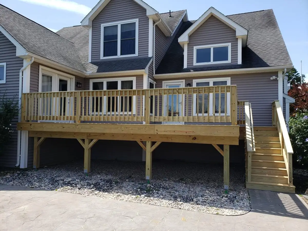 Photo of an All Wood decking with wood railings
