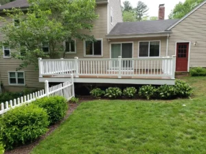 Finished Trex Saddle Brown decking, vinyl railings in CT