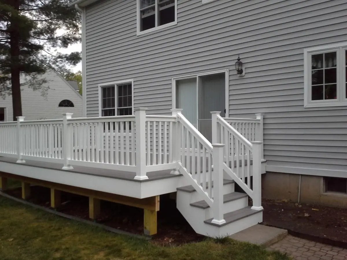 Trex Pebble Gray, PVC railings and PVC rim, risers and stringers